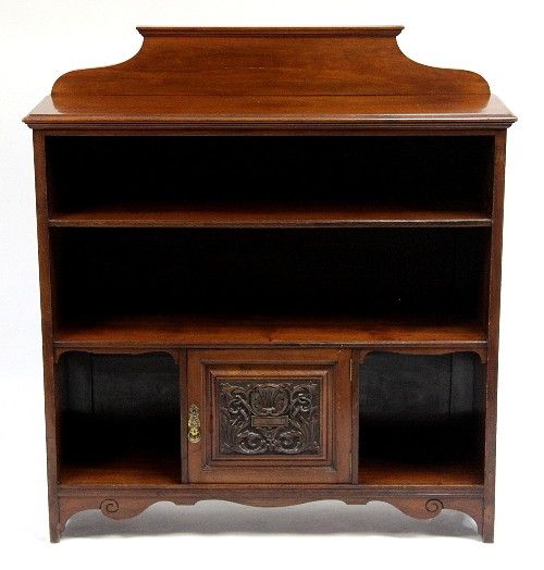 A walnut open bookcase with