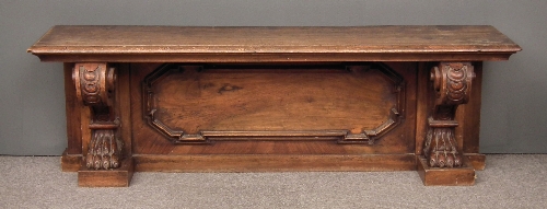 A walnut rectangular bench of