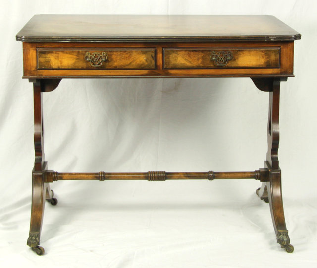 A walnut sofa table the crossbanded