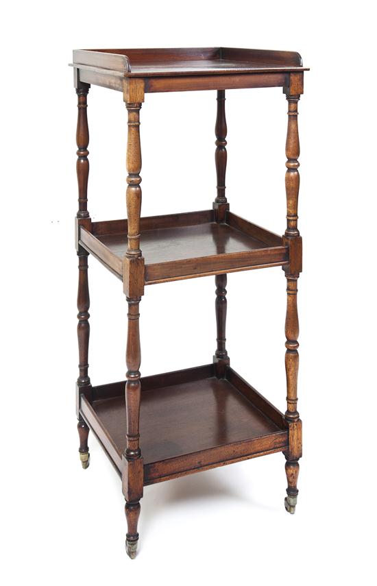 A Walnut Three-Tiered Stand the