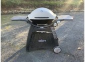 A Weber two burner propane gri