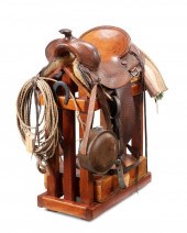 A WESTERN ROPING SADDLE, BY VI