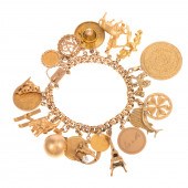 A WHIMSICAL CHARM BRACELET WIT