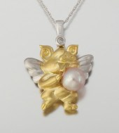 A Whimsical Gold and Diamond W