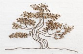 A WHIMSICAL METALWORK TREE FOR