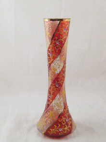 A white and ruby glass vase with