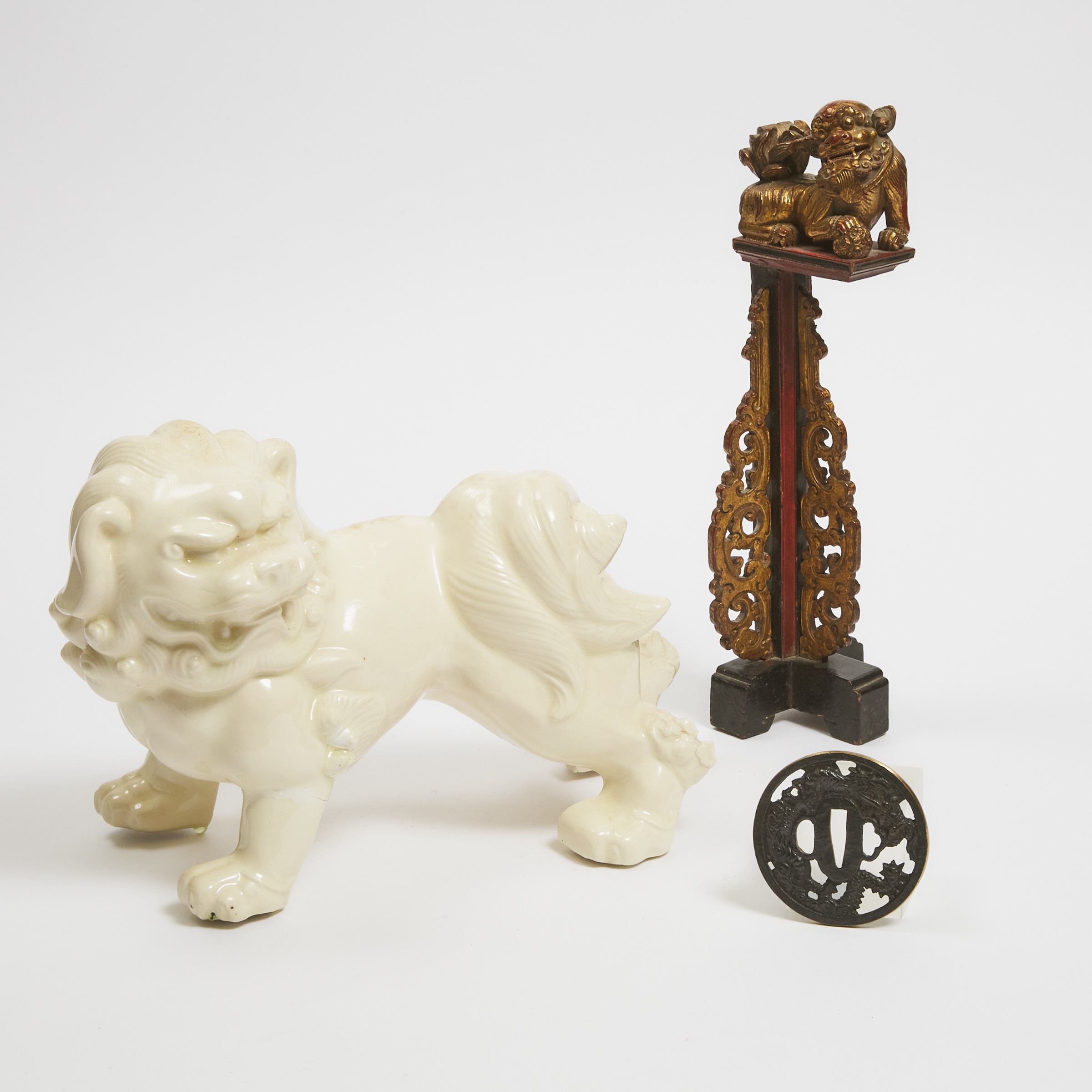 A White Glazed Ceramic Foo Dog,