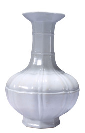 A WHITE-GLAZED MELON-RIBBED VA