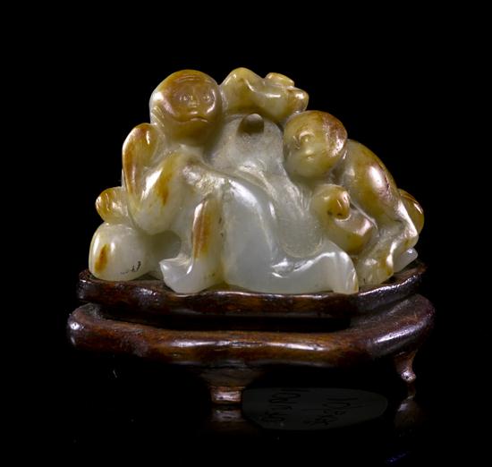 A White Jade and Russet Toggle of