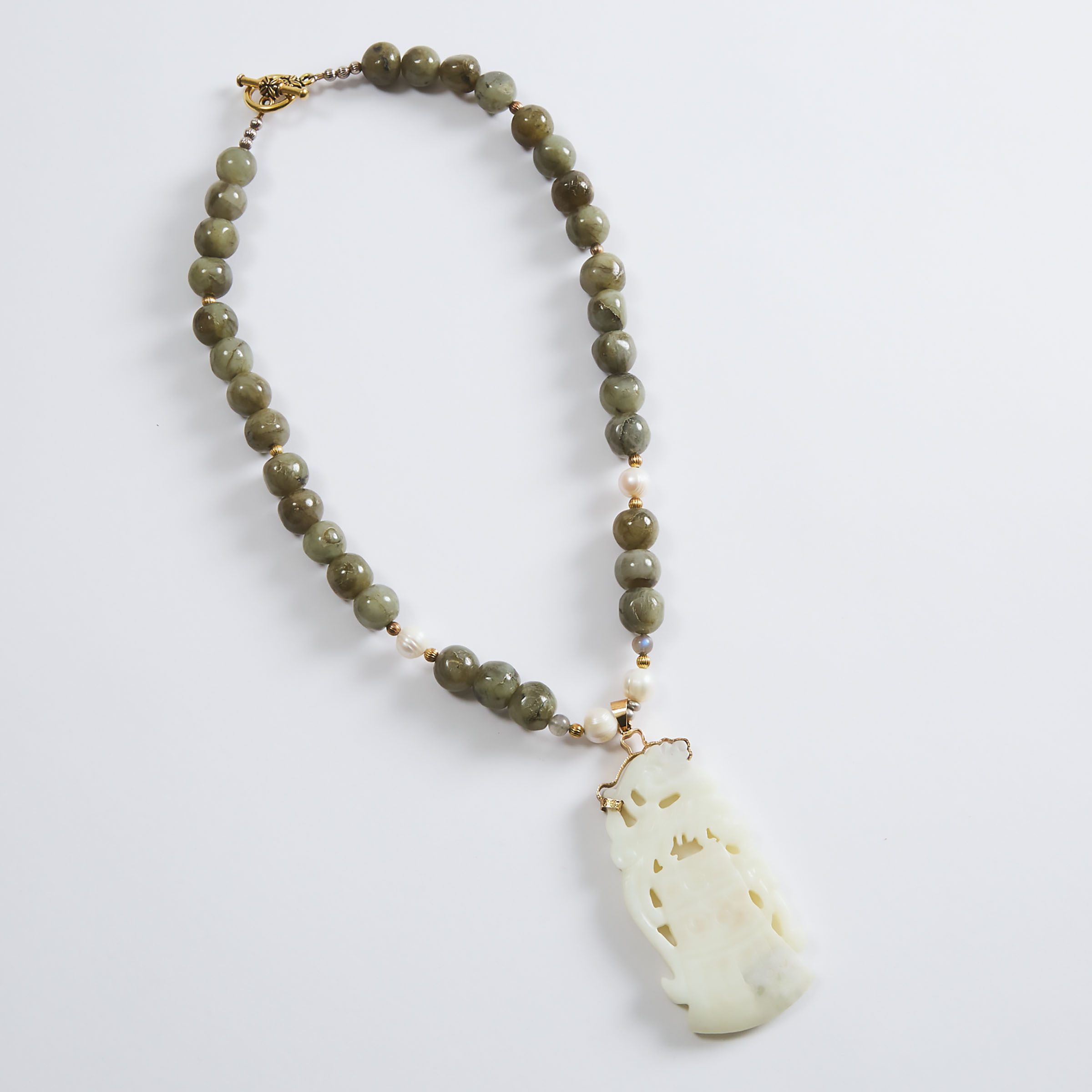 A White Jade Axe-Form Pendant
