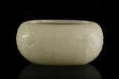 A WHITE JADE DRAGON-VEINED BRU