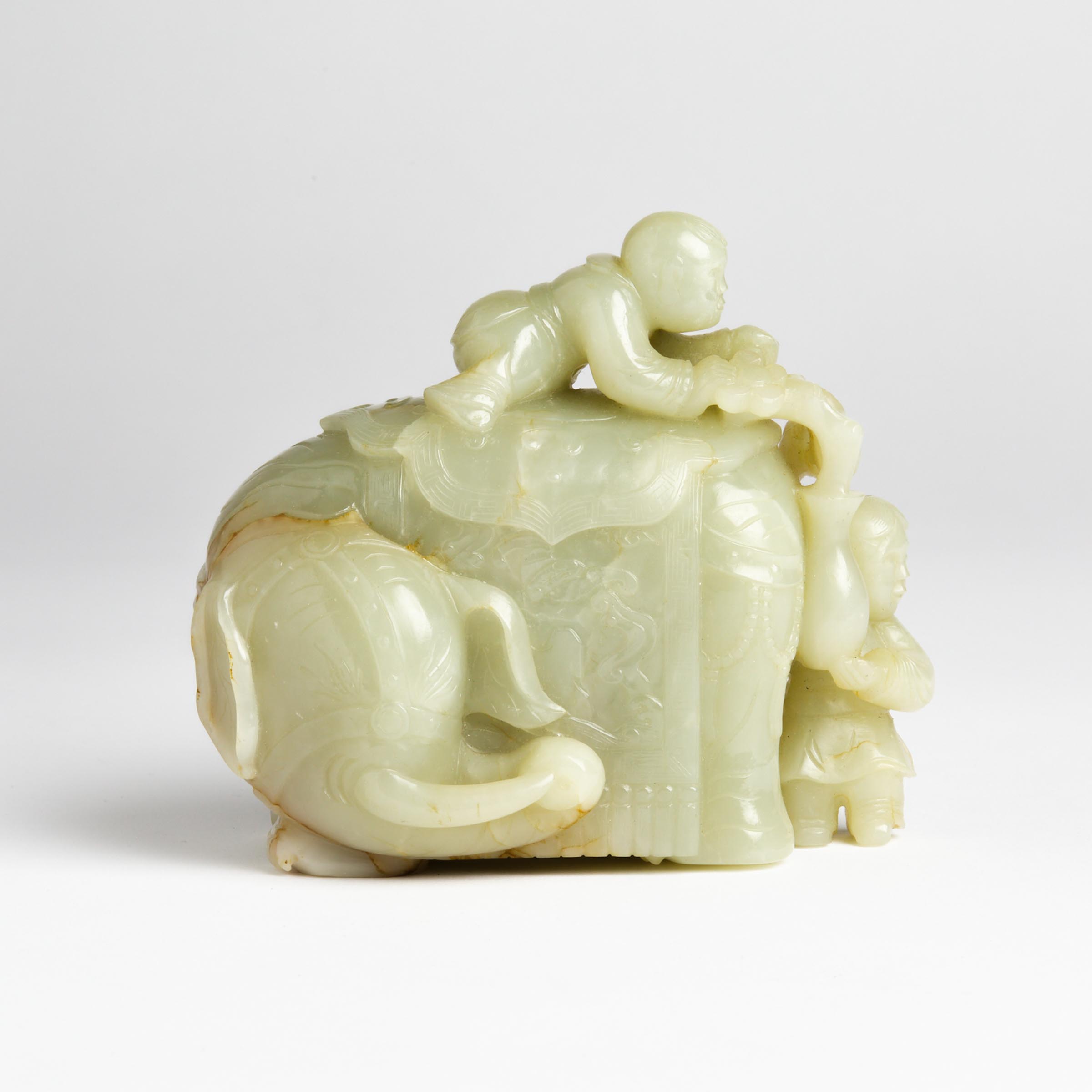 A White Jade 'Elephant and Boys'