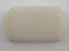A white jade pendant 3 x 4.5cm.