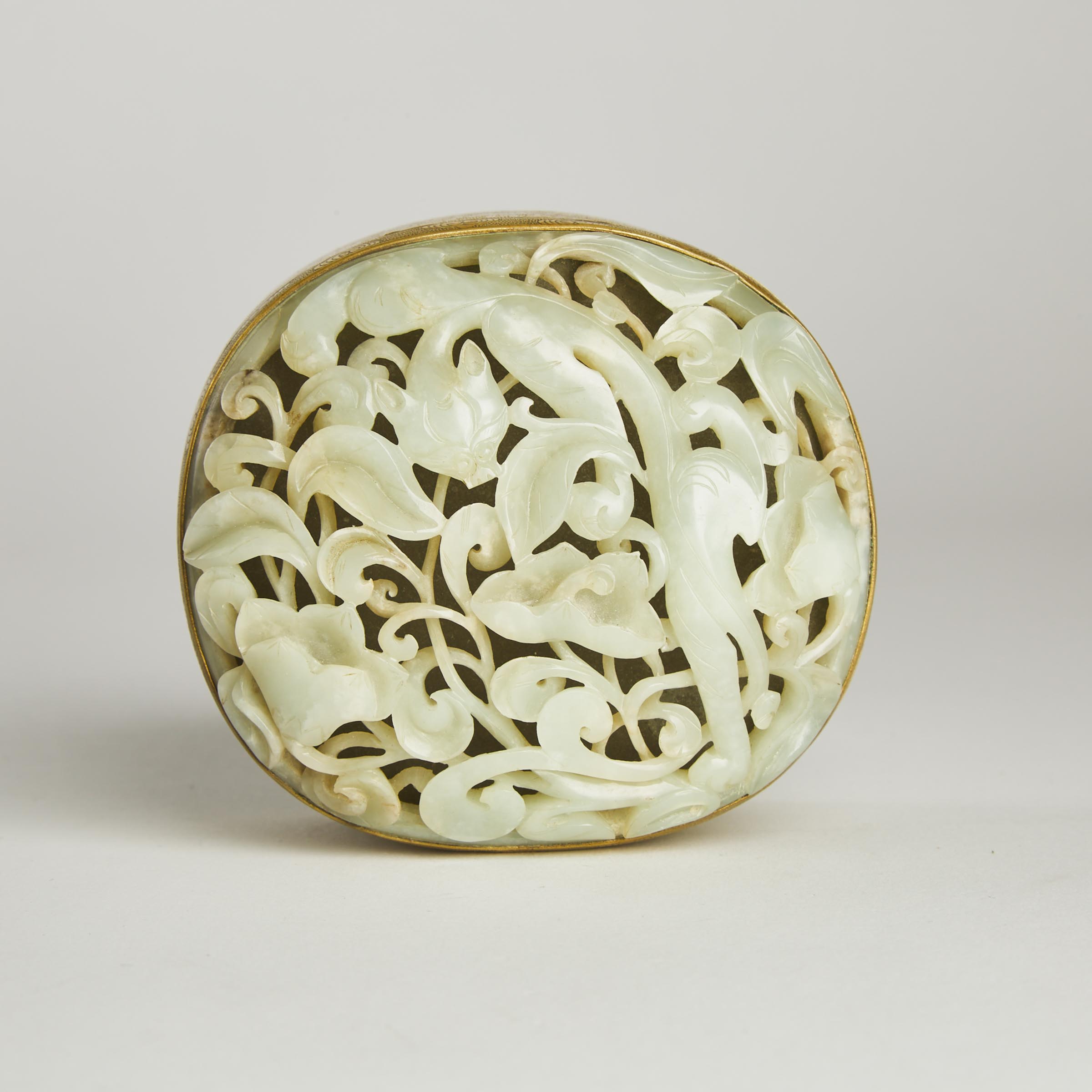 A White Jade Reticulated 'Dragon'