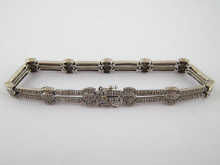 A white metal (tests 14 carat gold)