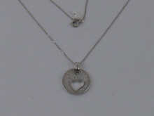 A white metal (tests 14 carat gold)