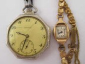 A white metal (tests 14ct gold