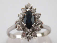 A white metal (tests 18 carat gold)