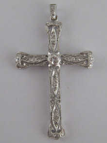 A white metal (tests 18 carat gold)