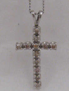 A white metal (tests 9 carat