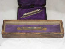 A white metal (tests silver)