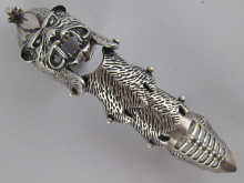A white metal tests silver heavy