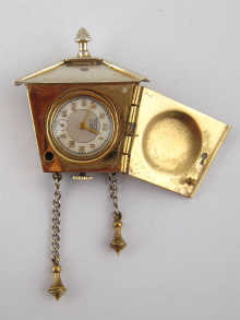 A white metal (tests silver) brooch