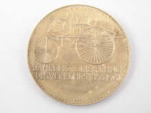 A white metal (tests silver)