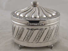 A white metal (tests silver and