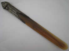A white metal (tests silver)