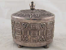 A white metal (tests silver)