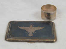 A white metal (tests silver)