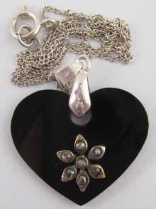 A white metal (tests silver)