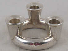 A white metal (tests silver)