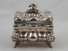 A white metal (tests silver) tea