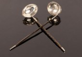 A white metal toddy ladle, mak