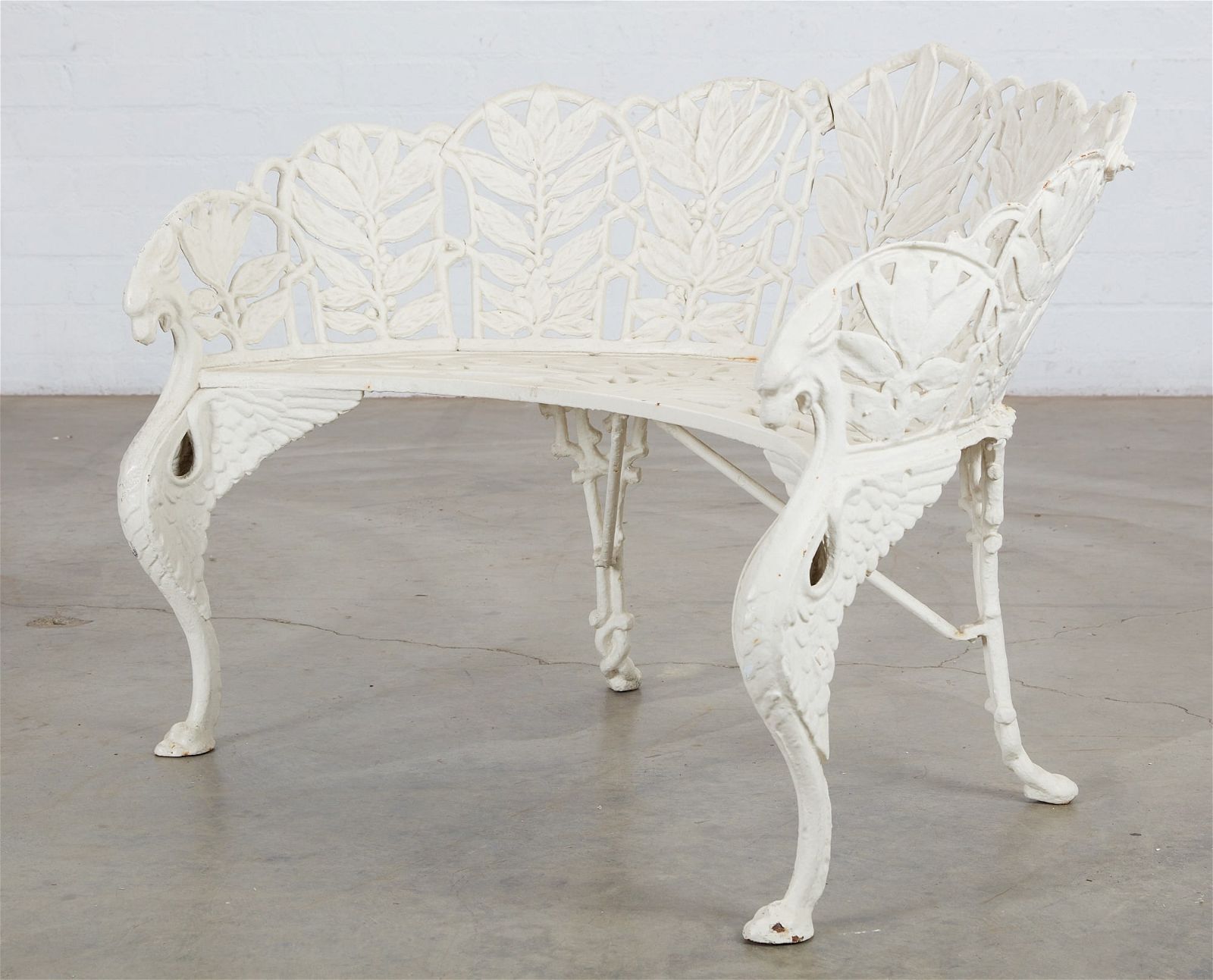 A WHITE PAINTED CAST IRON GARDEN