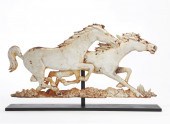 A WHITE PAINTED IRON RELIEF OF