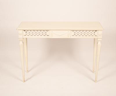 A white painted side table with a