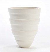 A WHITE RIMMED BISQUE VASEA wh