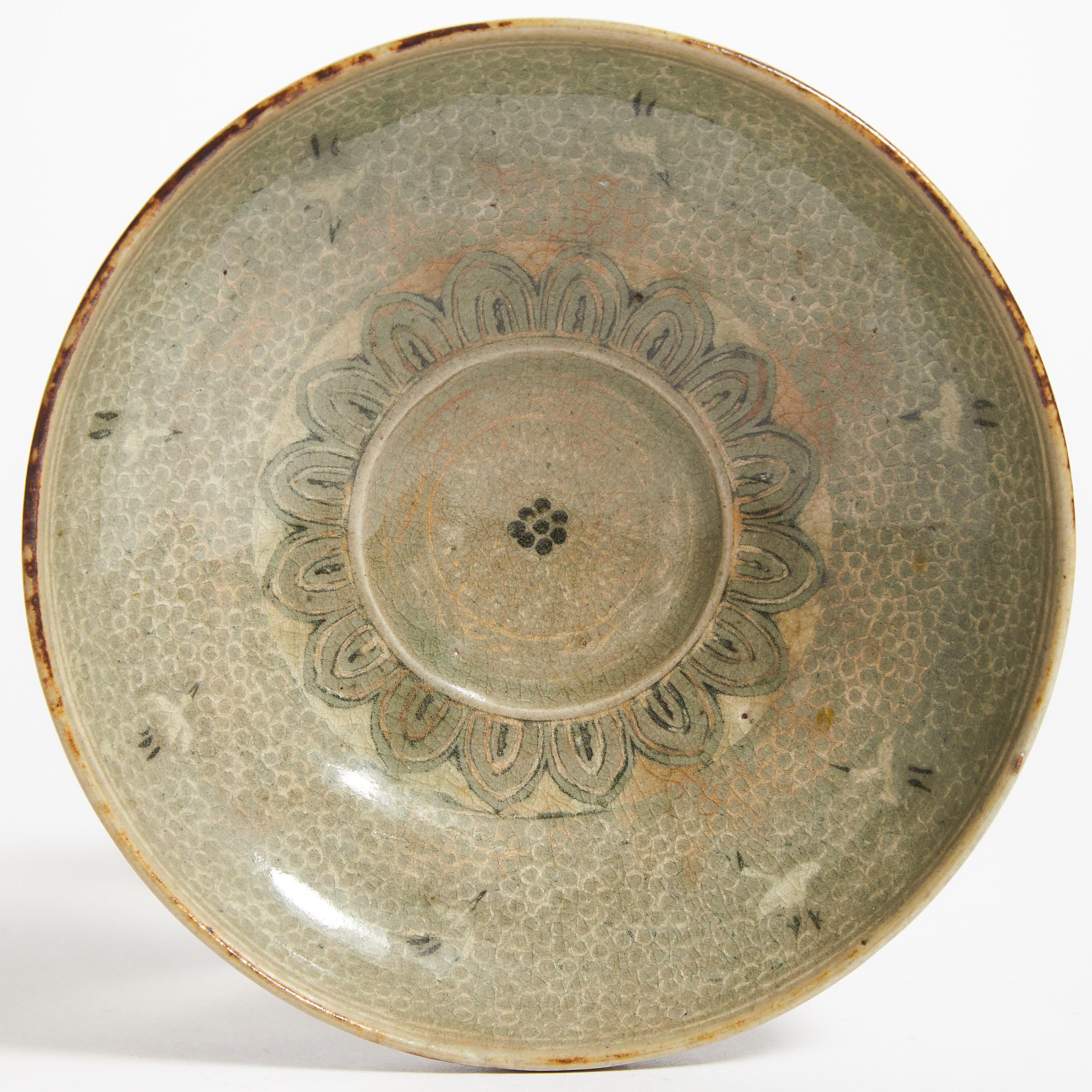 A White Slip Inlaid Celadon Shallow