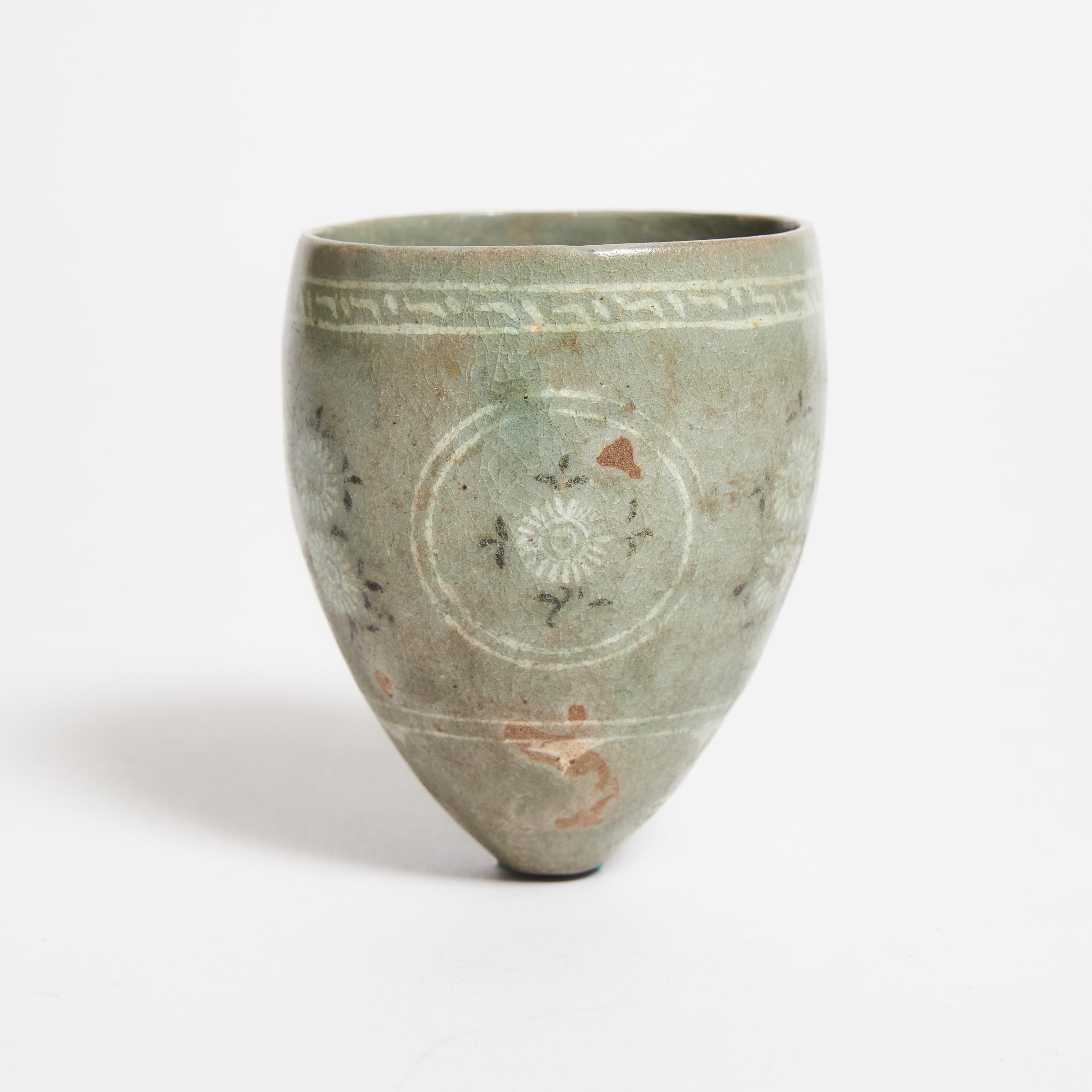 A White Slip Inlaid Stirrup Cup,