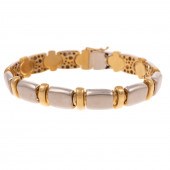 A WHITE & YELLOW GOLD BRUSHED
