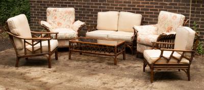 A wicker garden furniture suite