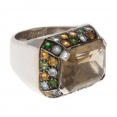 A WIDE 18K GEMSTONE RING BY SO