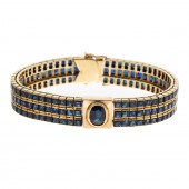 A WIDE BAR TRIPLE ROW SAPPHIRE