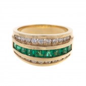 A WIDE FINE EMERALD & DIAMOND