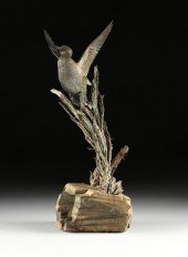 A WILDLIFE BRONZE, "DUCK IN FL
