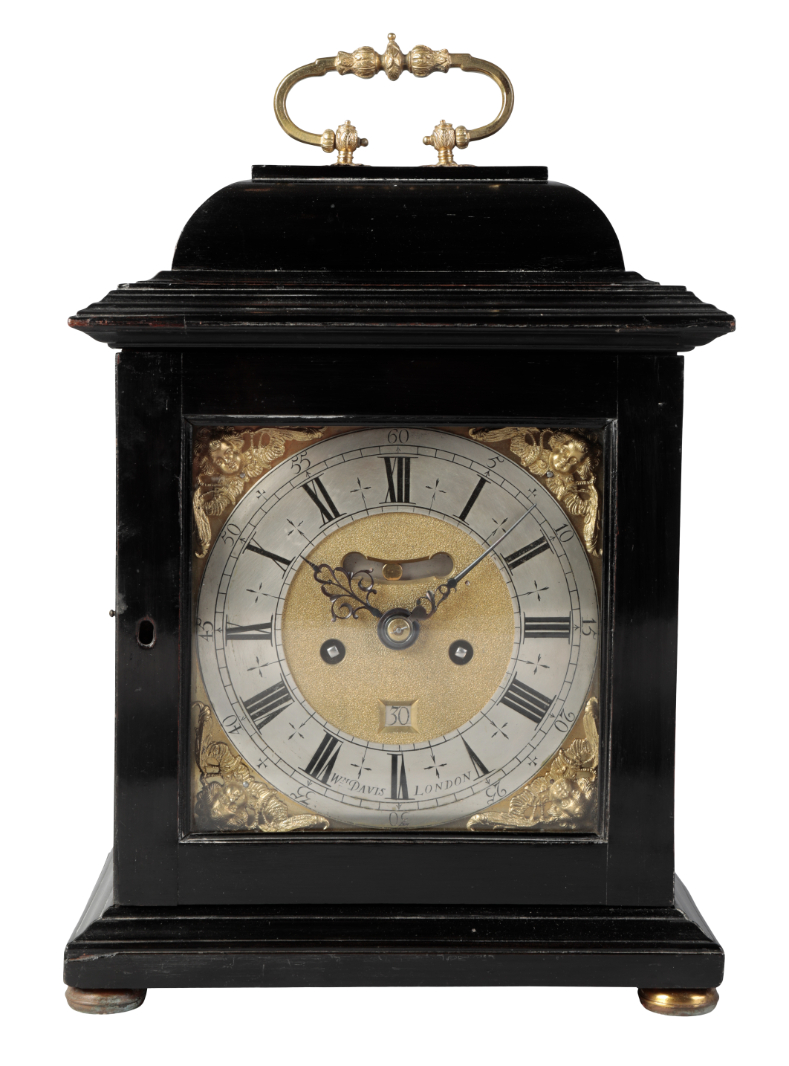 A WILLIAM III EBONISED BRACKET