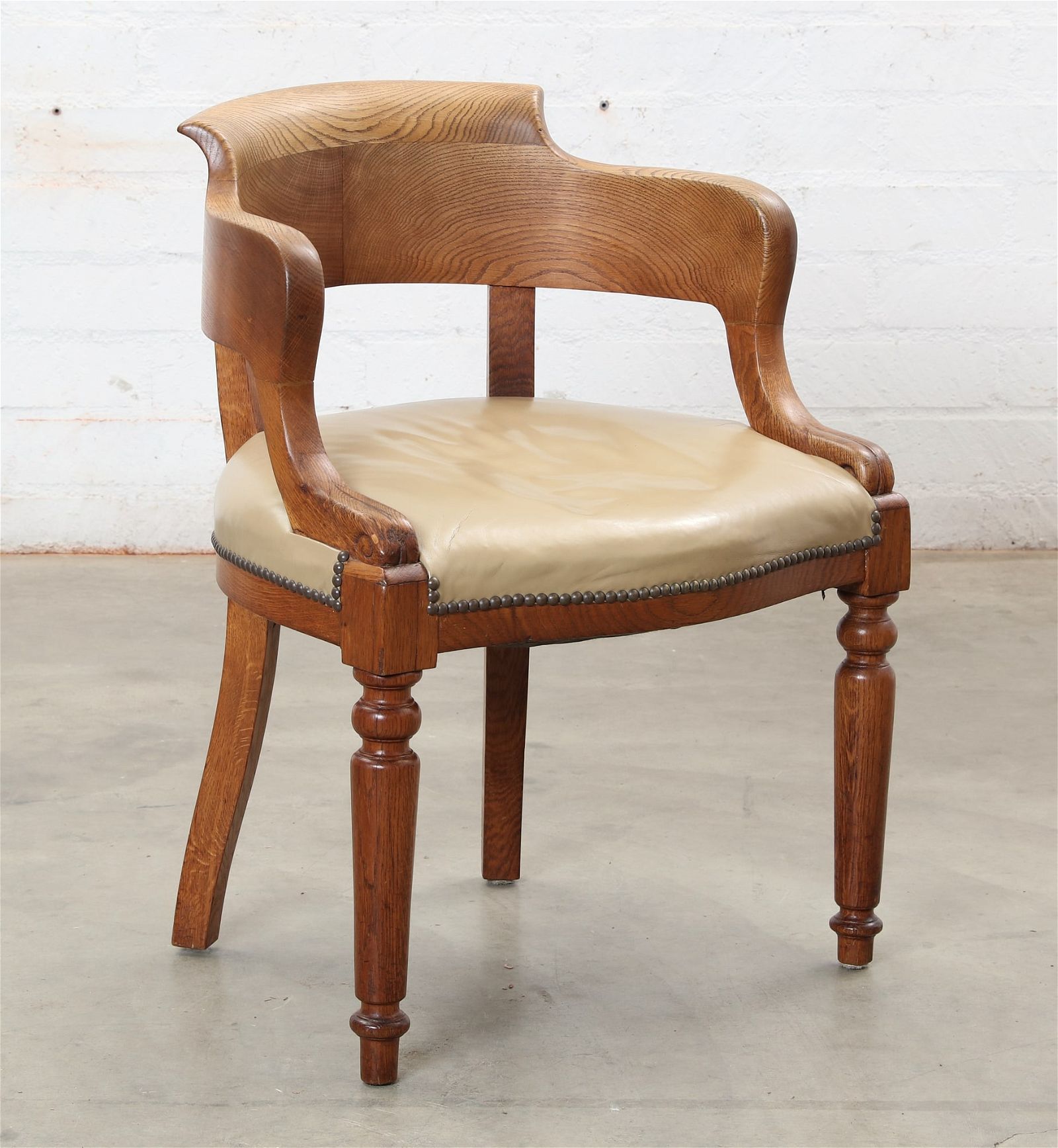 A WILLIAM IV OAK ARMCHAIRA